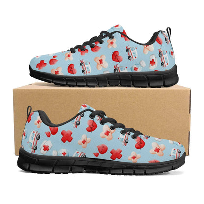 A pair of Ambulance Sneakers: Fun shoes for nurses, featuring a light blue background with a pattern of red crosses, bandaged hearts, and ambulance images. The sneakers have black laces and soles designed for comfort and are displayed on a plain brown shoe box.