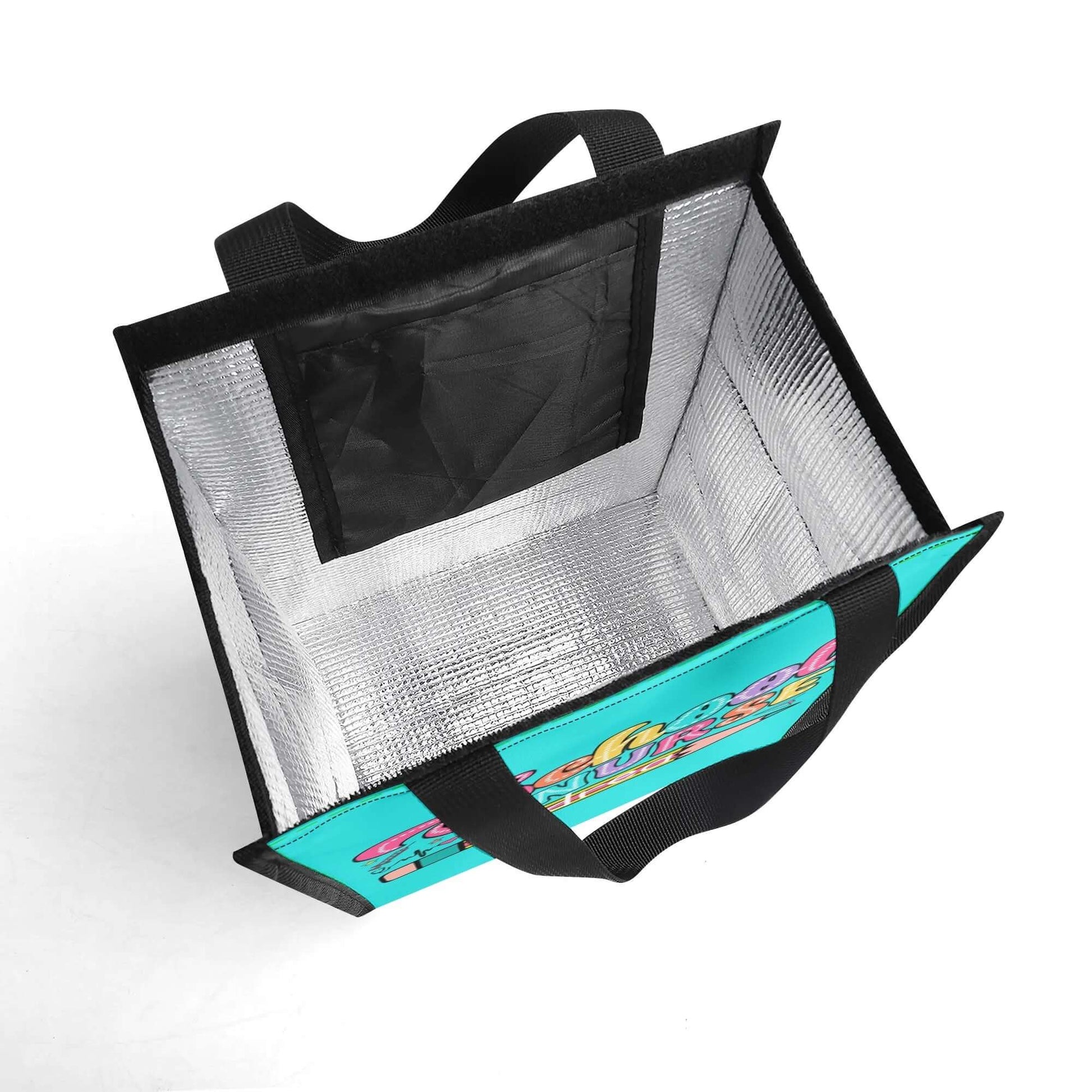 A top-down view of an open, empty Personalized Waterproof Lunch Bag for School Nurses reveals a turquoise exterior. The interior is lined with a reflective silver material, and the bag has black handles and a small black pocket inside. This durable lunch bag features a colorful exterior design with text.