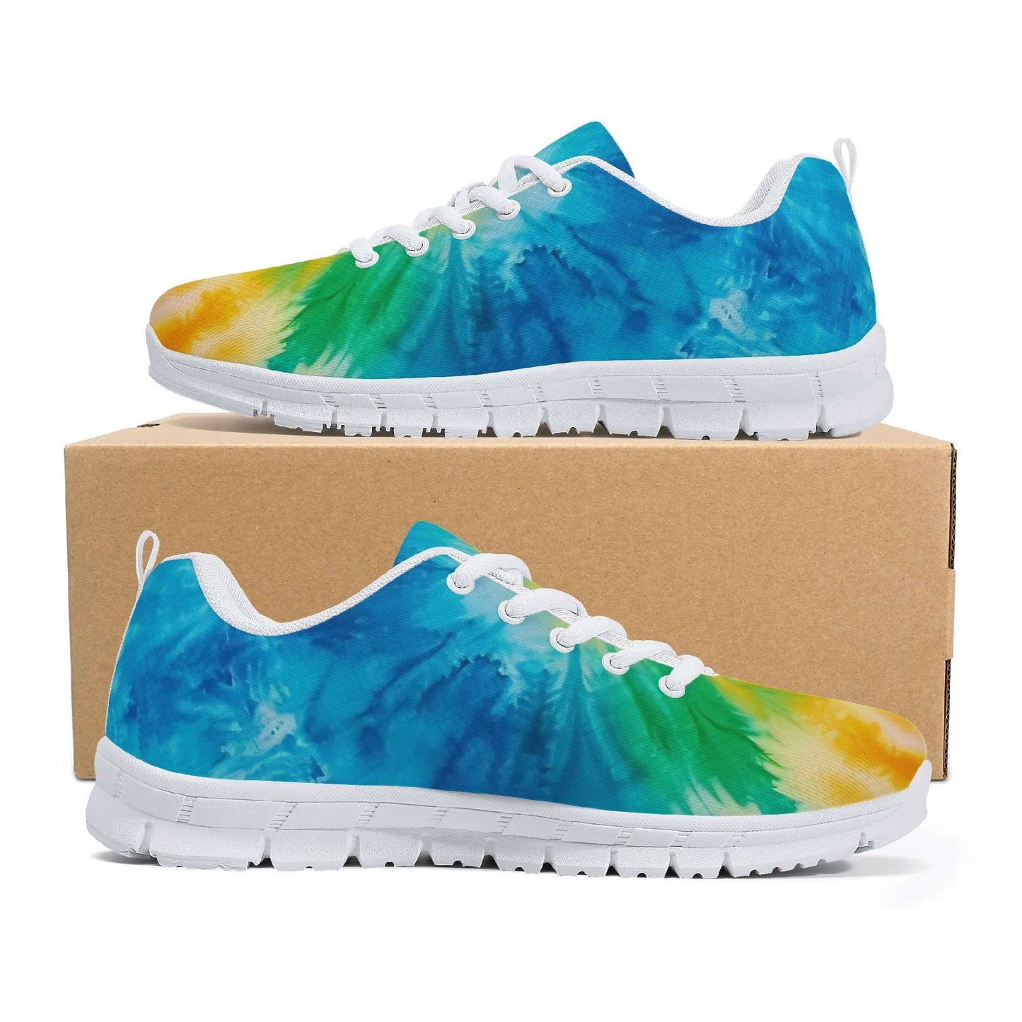 The Tie-Dyed Sneaker is a pair of stylish footwear featuring a distinct tie-dye pattern in vivid blue, green, and yellow hues. The sneakers are equipped with white laces and white soles that offer a textured grip. They are showcased atop a simple cardboard box.