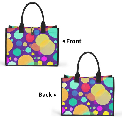 A Nurse Essentials Carry Bag: Reinforced Handles & Button Closure for Secure Storage is displayed from the front and back. This spacious design boasts an array of vibrant, overlapping circles in various sizes and colors, including yellow, pink, blue, and green, set against a purple background. The bag features black reinforced handles and trim.