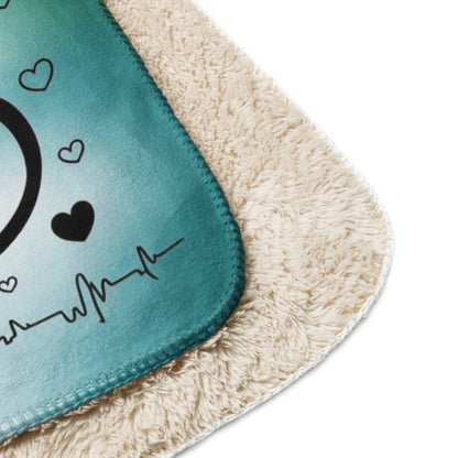 A warm blanket displaying the message "Nursing is a work of heart," highlighting the passion and care of nursing professionals.